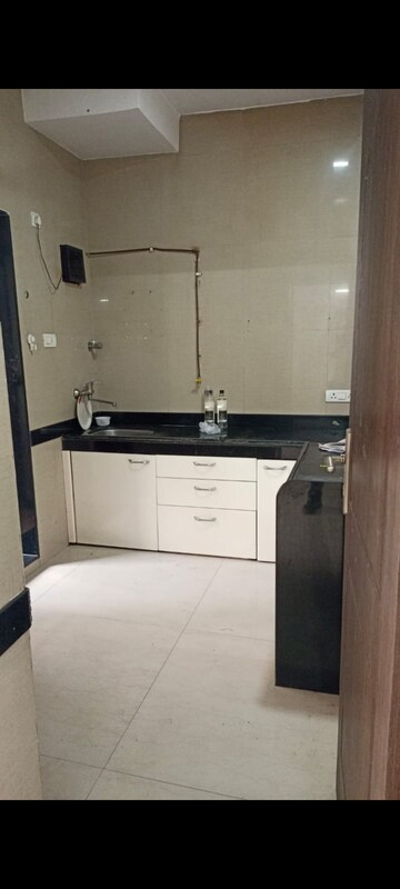 Kitchen in 1 BHK Apartment at K Raheja Heights, Malad East – for Rent