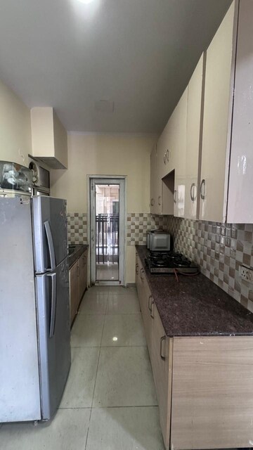 Kitchen in 3 BHK Apartment at Shubh City, Gaur City 1 – for Rent