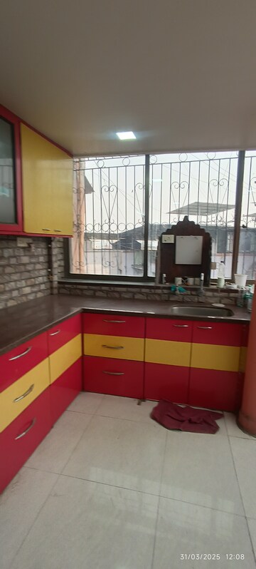 Kitchen in 1.5 BHK Apartment at Nerul Sector 20 – for Sale
