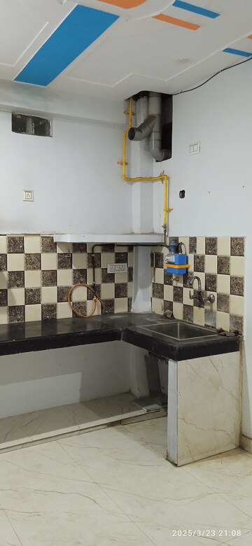 Kitchen in 2 BHK Builder Floor at Dwarka Mor – for Rent