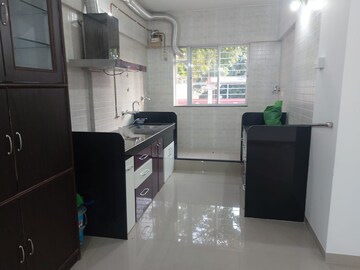 Kitchen in 3 BHK Apartment at Madhavbaug Society, Bhusari Colony – for Rent