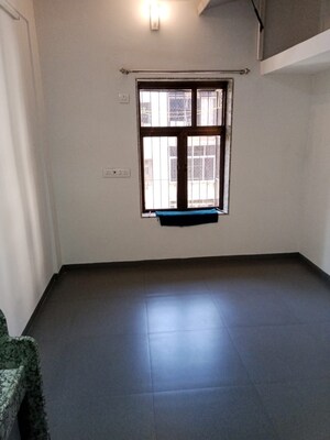 Room in 2 BHK Apartment at Satellite Garden, Goregaon East – for Sale