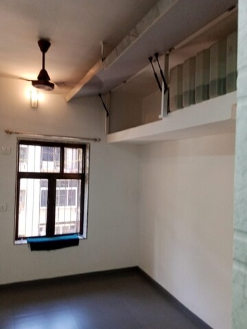 Room in 2 BHK Apartment at Satellite Garden, Goregaon East – for Sale