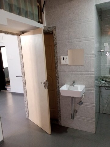 Bathroom in 2 BHK Apartment at Satellite Garden, Goregaon East – for Sale