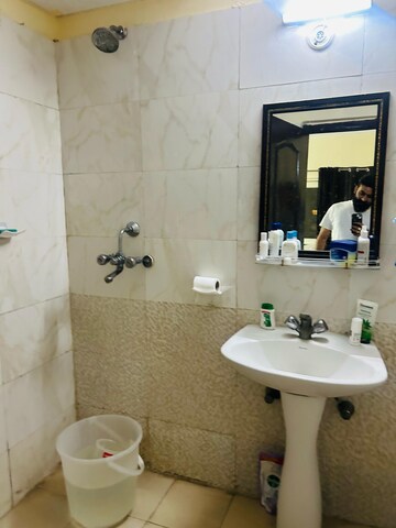 Bathroom in 2 BHK Apartment at Aims Golf City, Sector 75 – for Rent