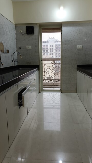Kitchen in 2 BHK Apartment at Rosa Oasis, Ghodbunder Road – for Rent