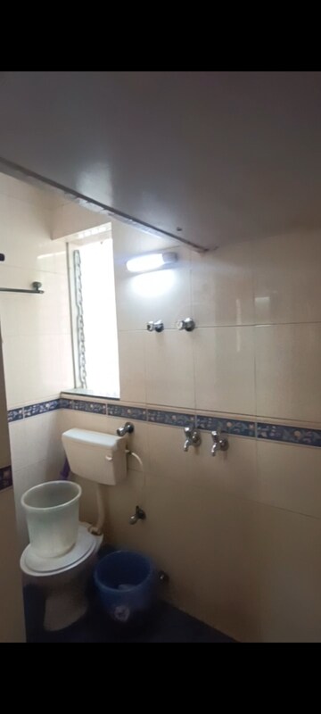Attached Bathroom in 1 BHK Apartment at Jai Shree Dhan CHS, Goregaon West – for Rent