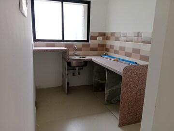 Kitchen in 1.5 BHK Apartment at Wadhwa Wise City, Old Panvel – for Rent