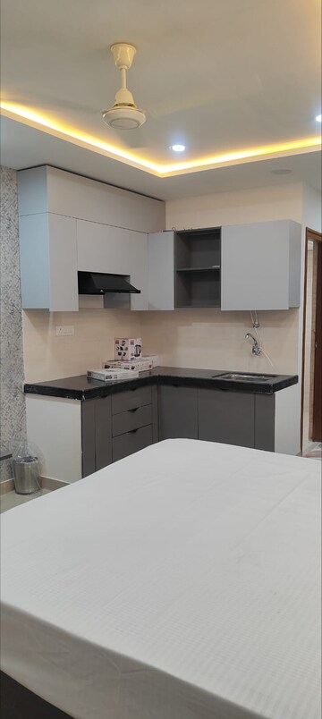 Kitchen in Studio Apartment at Okay Plus Solitaire Suites, Ramnagariya – for Rent