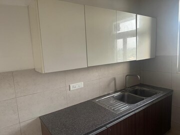 Kitchen in 3 BHK Apartment at Puri Anand Villas Phase II, Sector 81 – for Rent