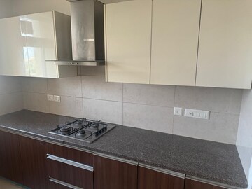Kitchen in 3 BHK Apartment at Puri Anand Villas Phase II, Sector 81 – for Rent