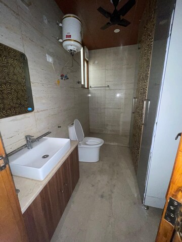 Bathroom in 2 BHK Apartment at Nimbus The Hyde park, Sector 78 – for Rent