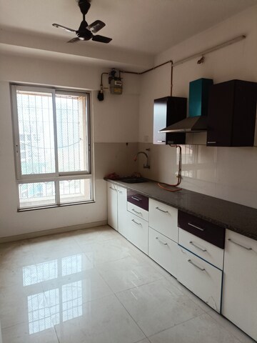 Kitchen in 1 BHK Apartment at Puranik Rumah Bali, Ghodbunder Road – for Sale