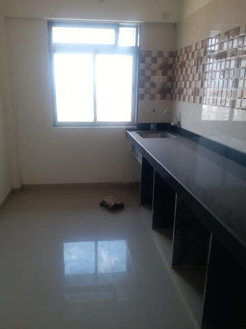 Kitchen in 1 BHK Apartment at Sahil Pride Residency Daffodil, Kasarvadavali – for Rent