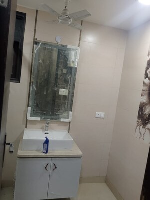 Bathroom in 4 BHK Builder Floor at Rajouri Garden – for Sale
