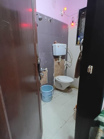 Bathroom in 2 BHK Apartment at Aakruti Aangan CHS, Anand Nagar – for Rent