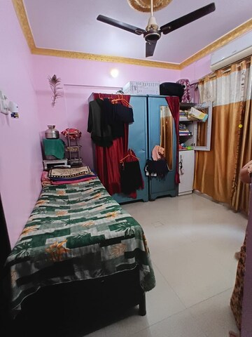 Bedroom in 2 BHK Apartment at Aakruti Aangan CHS, Anand Nagar – for Rent