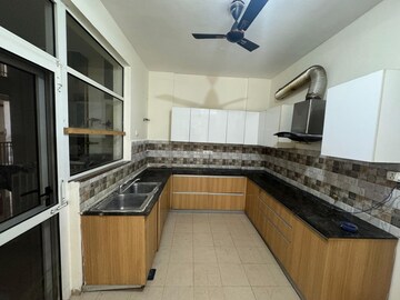 Kitchen in 3 BHK Apartment at Sushma Crescent, Dhakoli Village – for Sale