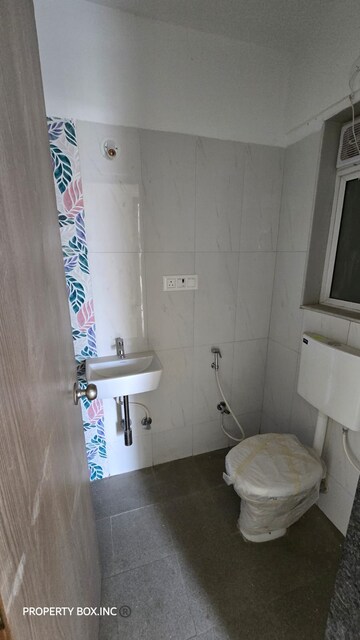 Bathroom in 2 BHK Apartment at Tilak Nagar Building, Tilak Nagar – for Rent