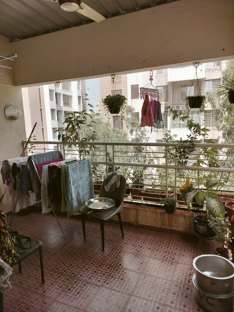 Balcony, chopada-sai-enclave 2 Bedroom 700 Sq.Ft. Apartment In Dhanori Pune 8430838