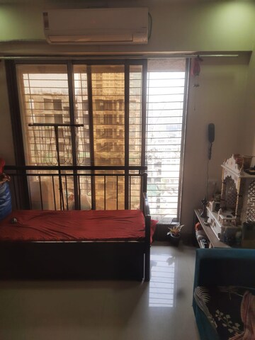 Living Room in 1 BHK Apartment at Right Aabiel Avenue, Malad West – for Sale