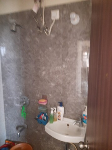 Bathroom in 1 BHK Apartment at Right Aabiel Avenue, Malad West – for Sale