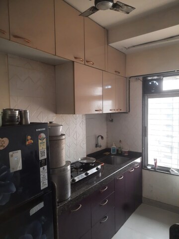 Kitchen in 1 BHK Apartment at Right Aabiel Avenue, Malad West – for Sale