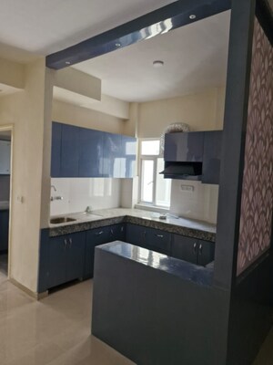 Kitchen in 2 BHK Apartment at ROF Aalayas, Sector 102 – for Sale