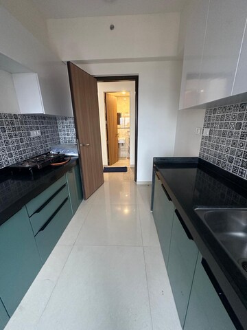 Kitchen in 3 BHK Apartment at Gala Evita Empress, Parel – for Rent