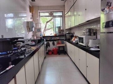 Kitchen in 3 BHK Apartment at Shyam Niwas CHS, Cumbala Hill – for Sale