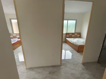 Room in 2 BHK Apartment at Maitree Mega City, Dhayari – for Sale