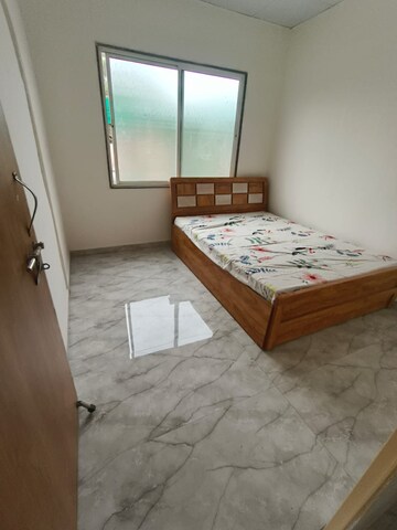 Bedroom in 2 BHK Apartment at Maitree Mega City, Dhayari – for Sale