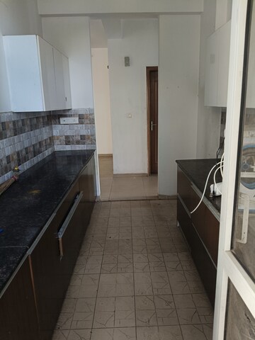 Kitchen in 3 BHK Apartment at Sushma Crescent, Dhakoli Village – for Rent