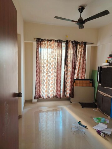 Living Room in 2 BHK Apartment at Mantra Ira, Undri – for Rent