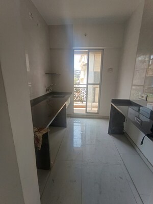 Kitchen in 1 BHK Apartment at Om Panvelkar Empire, Ambernath West – for Sale