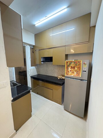 Kitchen in 2 BHK Apartment at Signature The Millennia 2, Sector 37d – for Rent