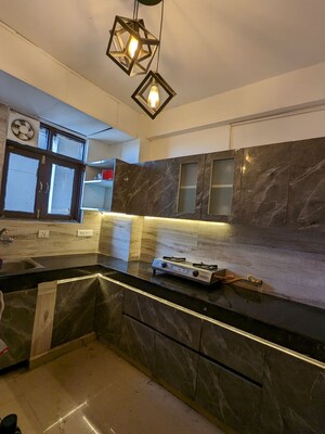 Kitchen in 2 BHK Apartment at Charms Castle, Raj Nagar Extension – for Sale