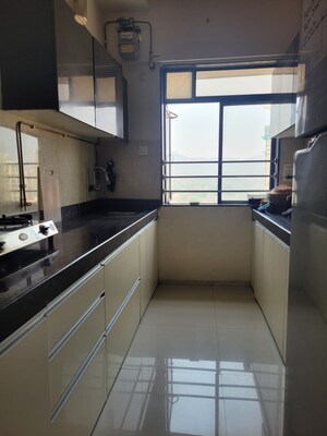 Kitchen in 3 BHK Apartment at Satguru Solitaire, Kasarvadavali – for Sale