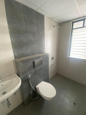 Bathroom in 2 BHK Apartment at Shapoorji Pallonji Joyville Hinjewadi, Hinjewadi – for Rent