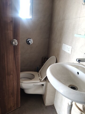 Bathroom in 2 BHK Apartment at Galaxy Green Woods, Kharghar – for Rent
