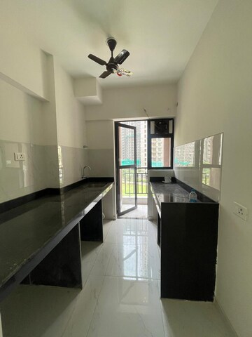 Kitchen in 2 BHK Apartment at Runwal Gardens, Dombivli East – for Rent