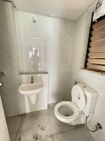 Bathroom in 2 BHK Apartment at Runwal Gardens, Dombivli East – for Rent