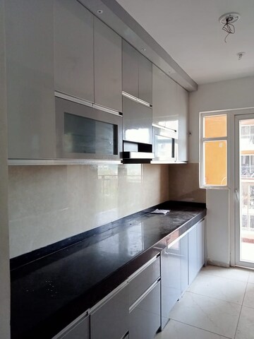 Kitchen in 3 BHK Apartment at Rishita Manhattan, Gomti Nagar – for Rent