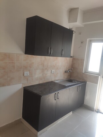 Kitchen in 2 BHK Apartment at Gardenia Golf City, Sector 75 – for Rent