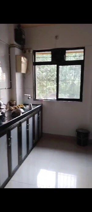 Kitchen in 1 BHK Apartment at Unnathi Woods Phase 1 And 2, Ghodbunder Road – for Sale