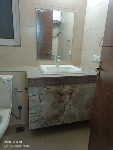 Bathroom in 3 BHK Apartment at Puri Anand Villas Phase II, Sector 81 – for Rent