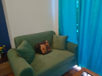 Living Room in Studio Apartment at Gaur City Center, Sector 4, Greater Noida – for Rent