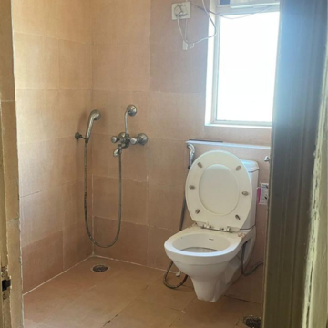 Bathroom in 1 RK Apartment at Paras Tierea, Sector 137 – for Rent