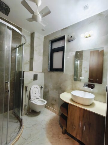 Bathroom in 4 BHK Builder Floor at Kohli One Malibu Town, Sector 47 – for Sale