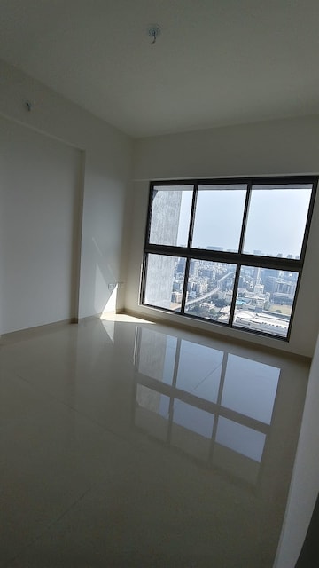 Room in 2 BHK Apartment at Sheth Irene, Malad West – for Rent